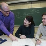 Greg Evans teaching students