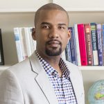 Kai James in his office