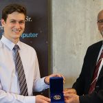 Sandro Young accepting Governor General’s Silver Medal from Professor Farid Najm