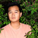 Jonny Sun in bushes