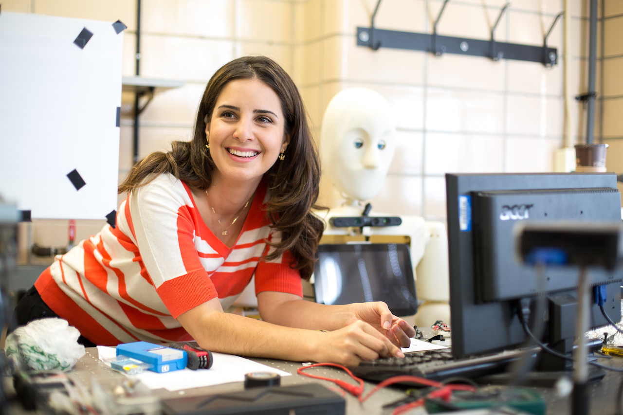 Female professor in robotics lab