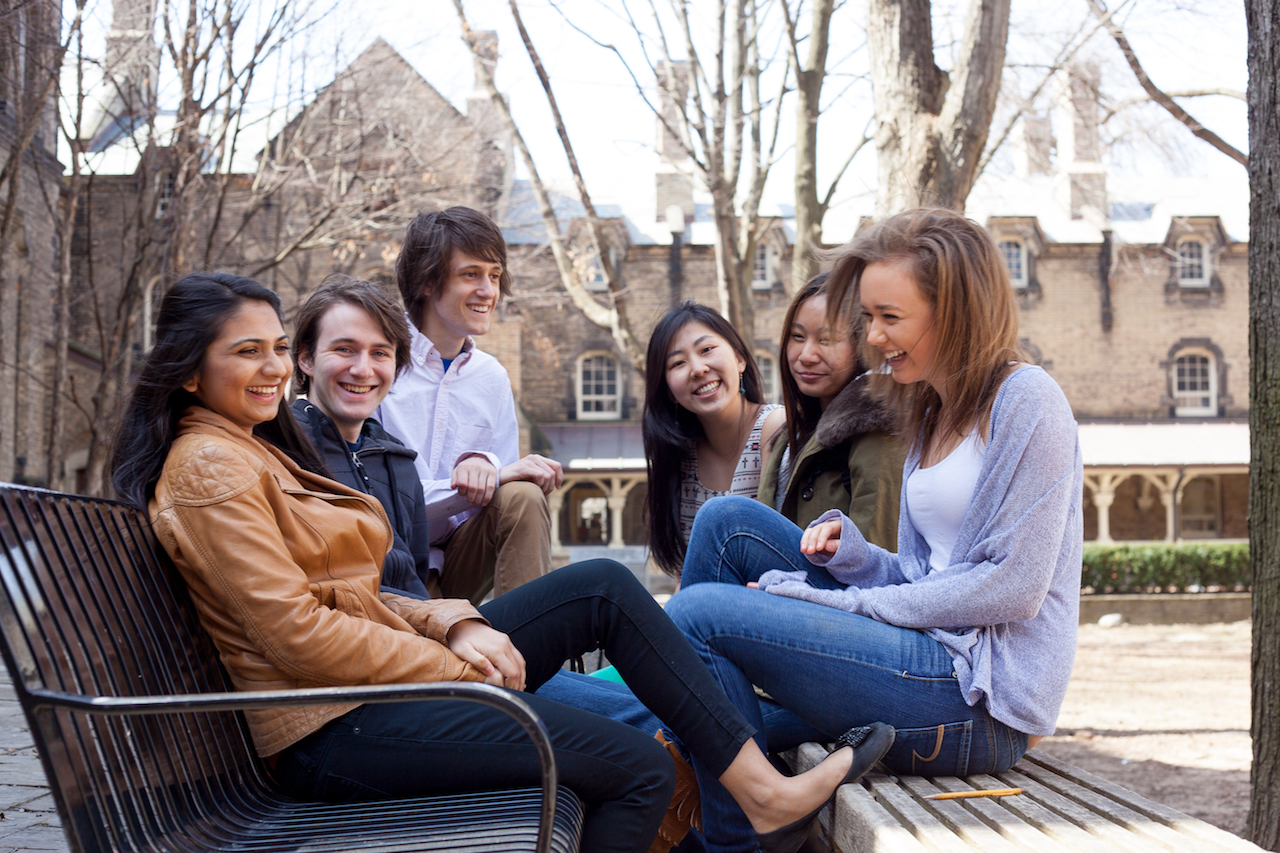 Students sitting in courtyard