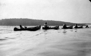 campers on canoes